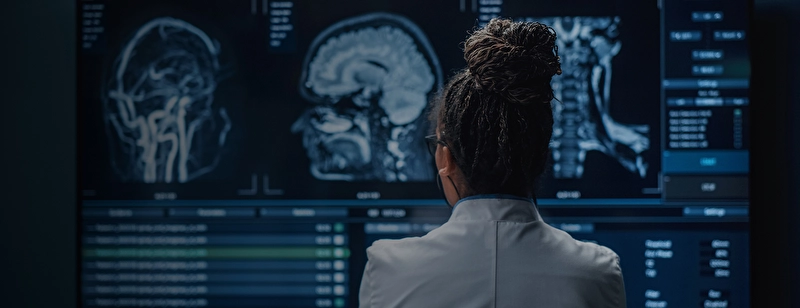 A radiologist analysing results from a brain scan.